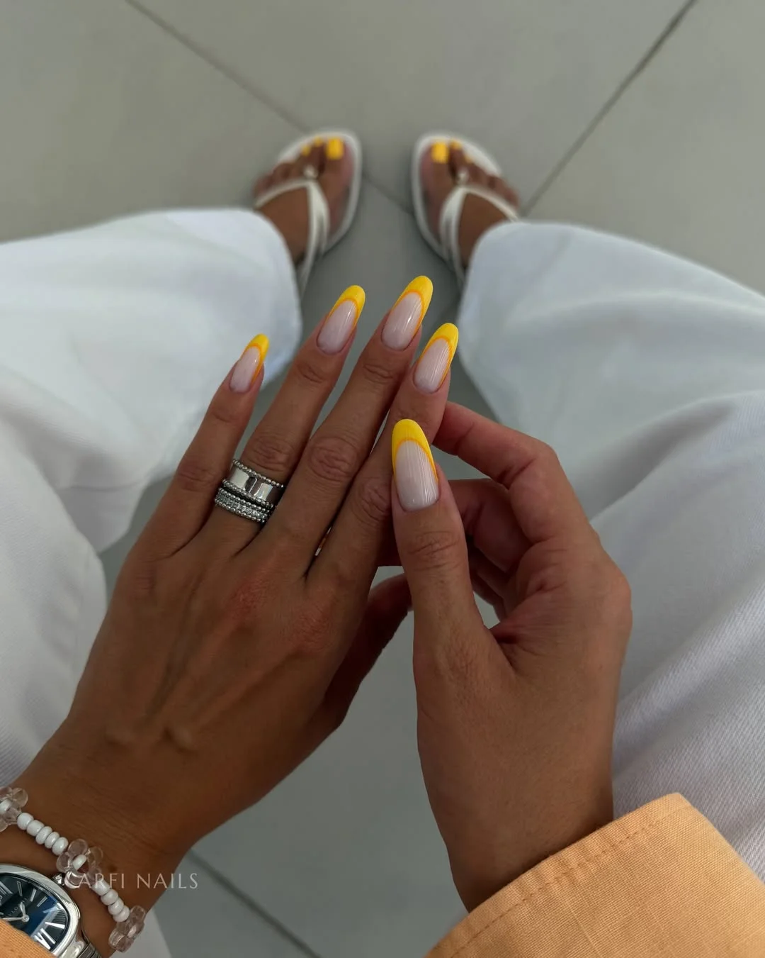 july nails design ideas 2026 Sunny Yellow French Tips for Peak Summer Energy