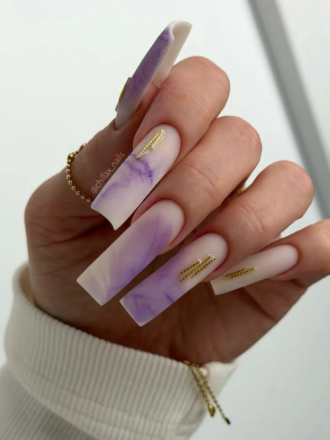 june manicure ideas 2026 Lavender Marble With Gold Accents
