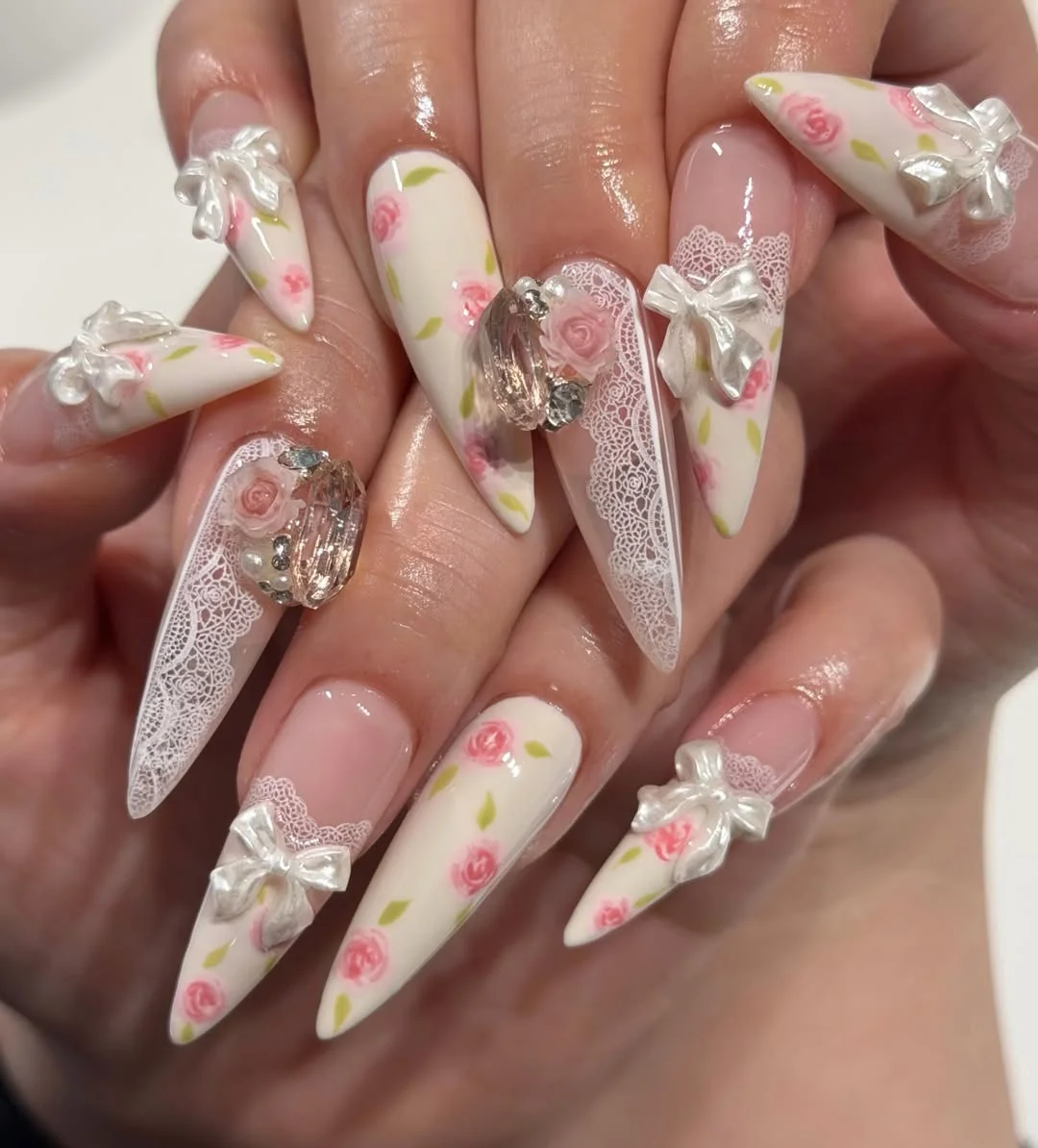 june manicure ideas 2026 Romantic Lace And Rose Statement Nails