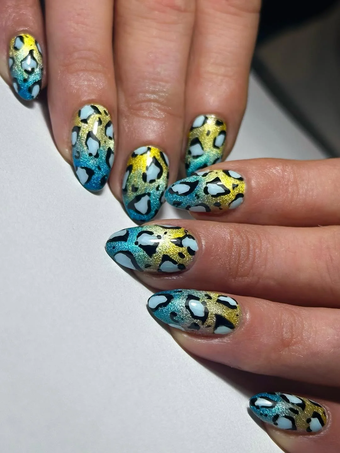 june manicure ideas 2026 Wild Leopard Nails With Electric Color