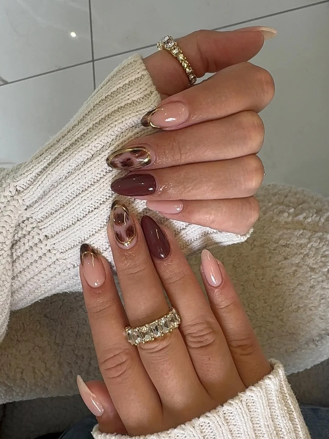 summer oval nails 2026 Caramel Marble Accents with Warm Chocolate Tones