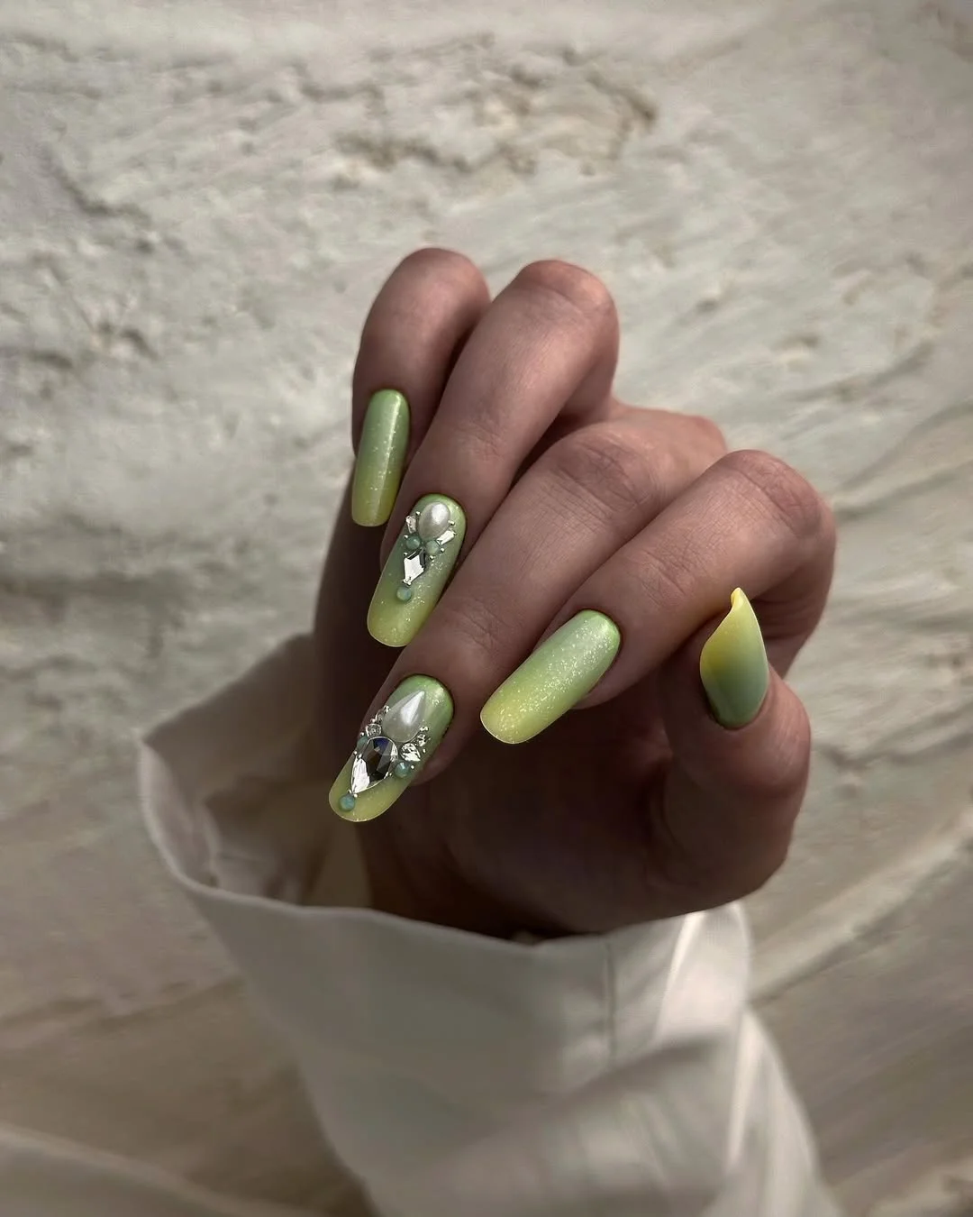 summer oval nails 2026 Fresh Pistachio Green Nails with Sparkling Jewel Details