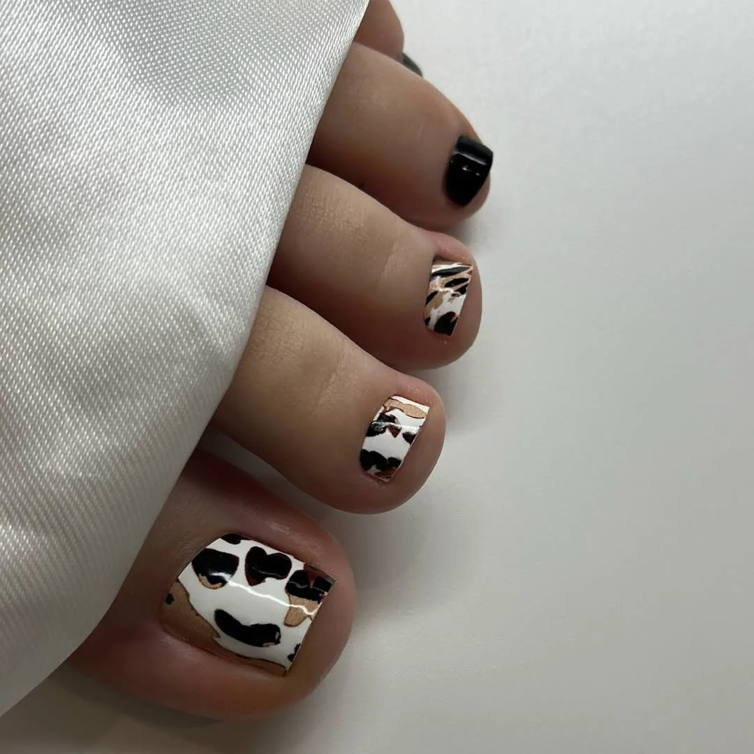 summer pedicure nail art 2026 Modern Cow Print Pedicure With Neutral Tones