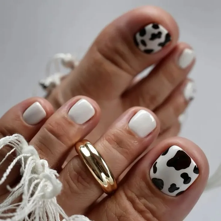 summer toe nails design ideas 2026 Modern Cow Print in Crisp White