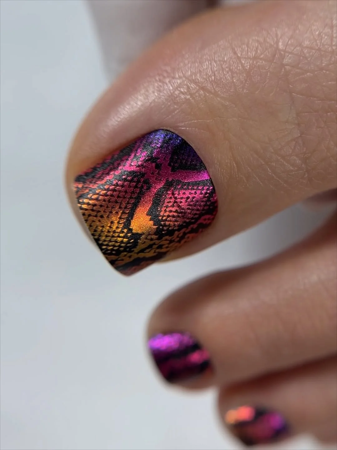 summer toe nails design ideas 2026 Sunset Chrome Snake Pattern