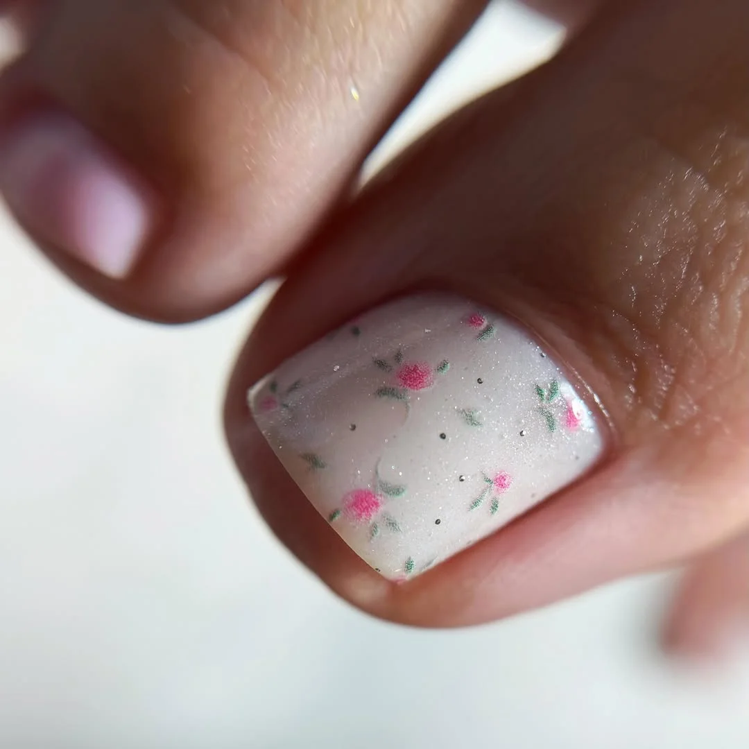 summer toe nails design ideas 2026 Soft Floral Whisper Pedicure