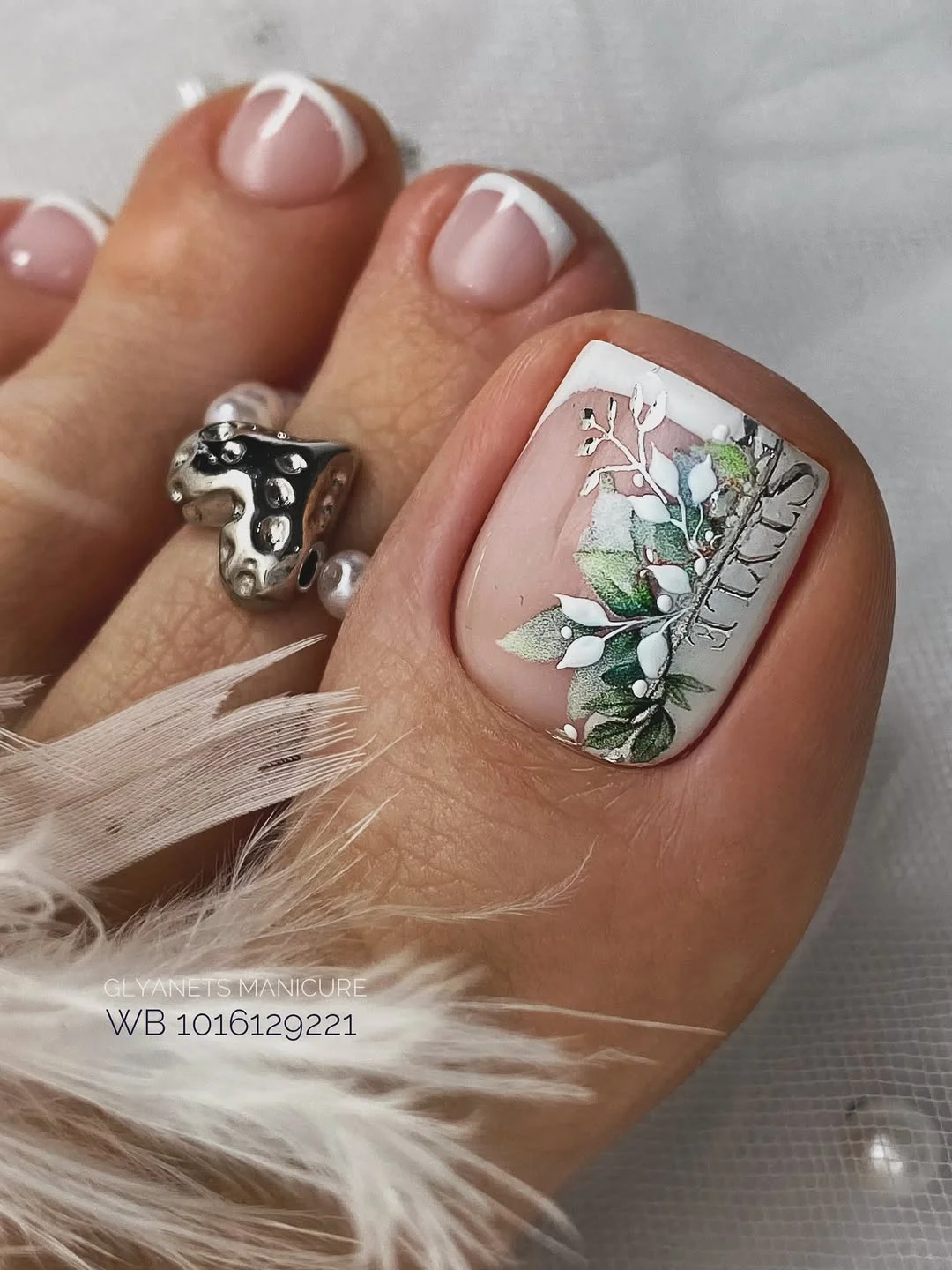 summer white french toes 2026 Botanical French Pedicure with Delicate Leaf Art