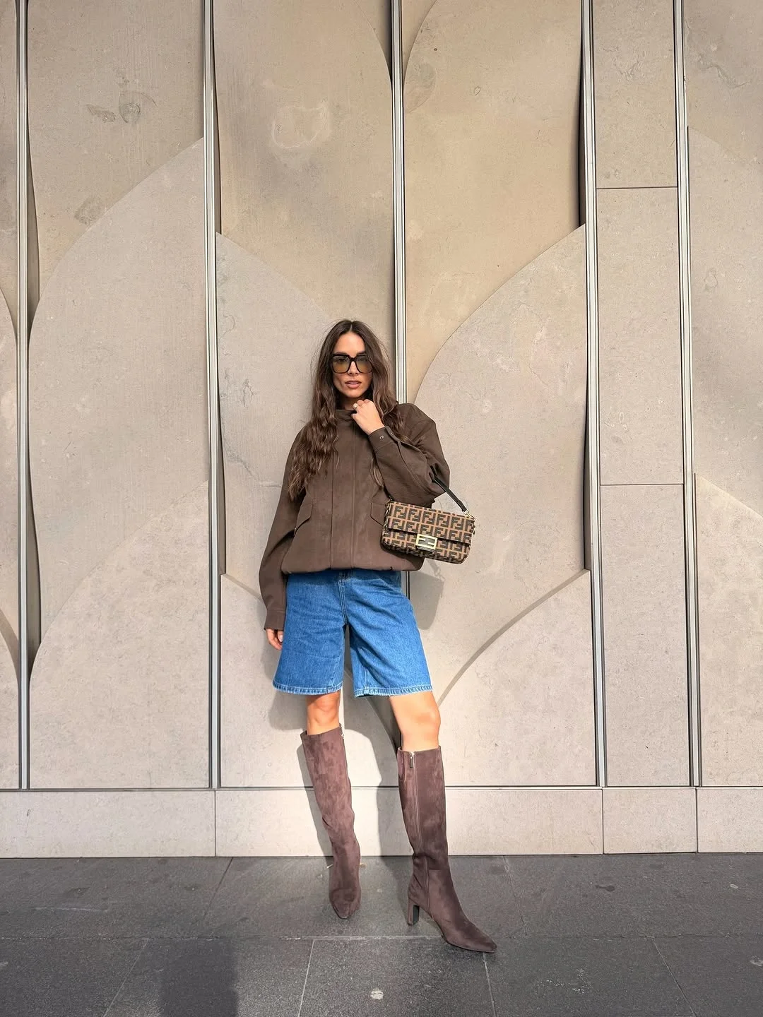 what are the best fall outfits for casual days? Denim Shorts And Tall Boots For Transitional Weather