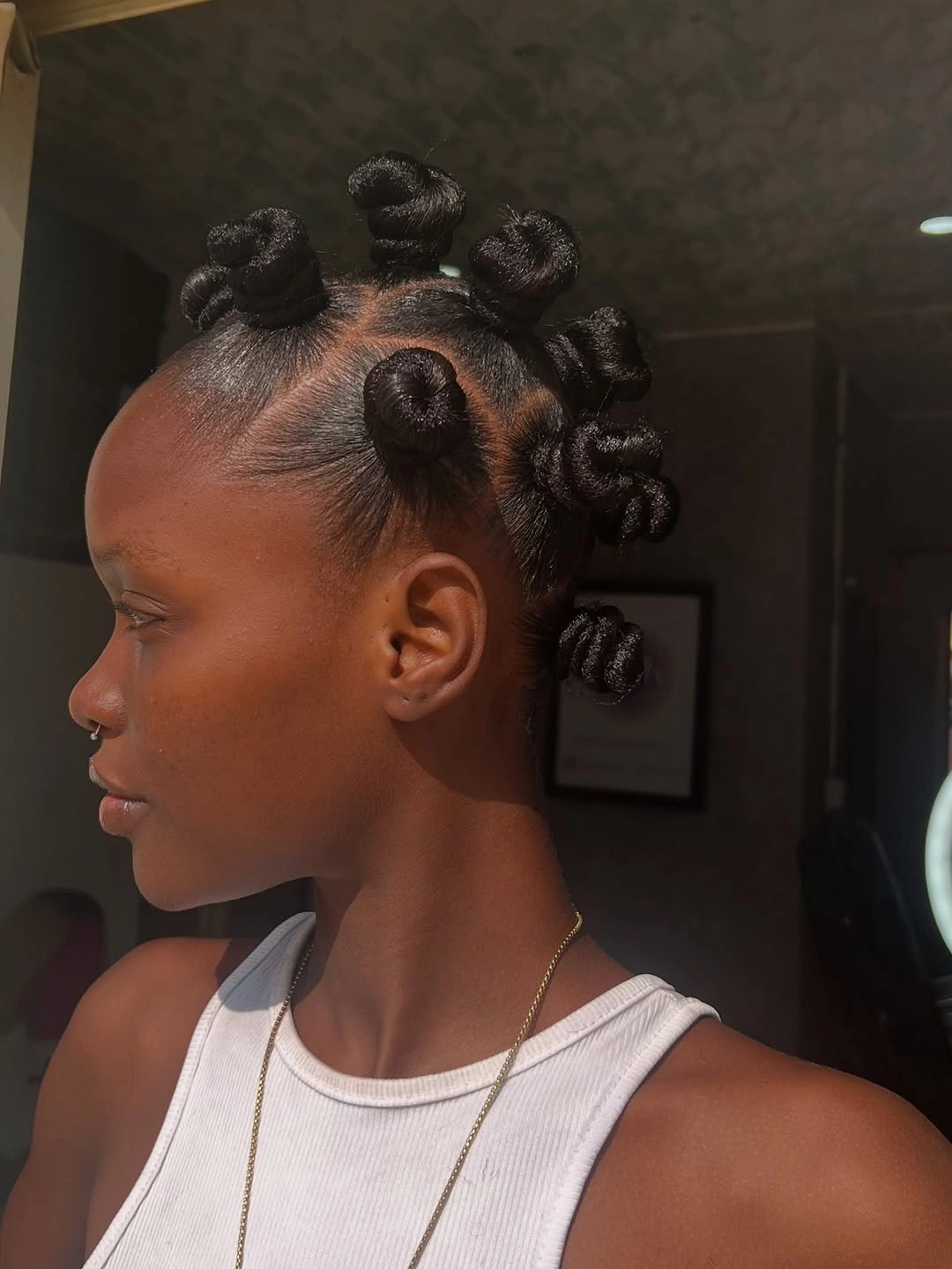 bantu knots hairstyles Classic Sculpted Bantu Knots With Clean Parting