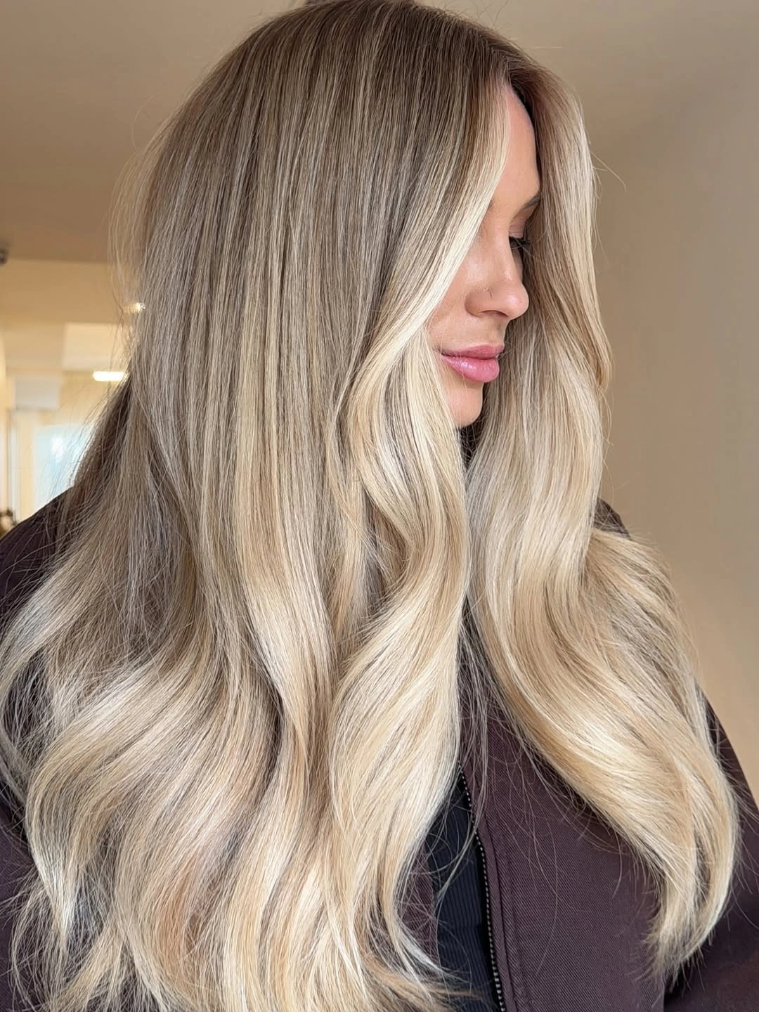 beige blond hair color Glossy Beige Blonde With Soft Waves