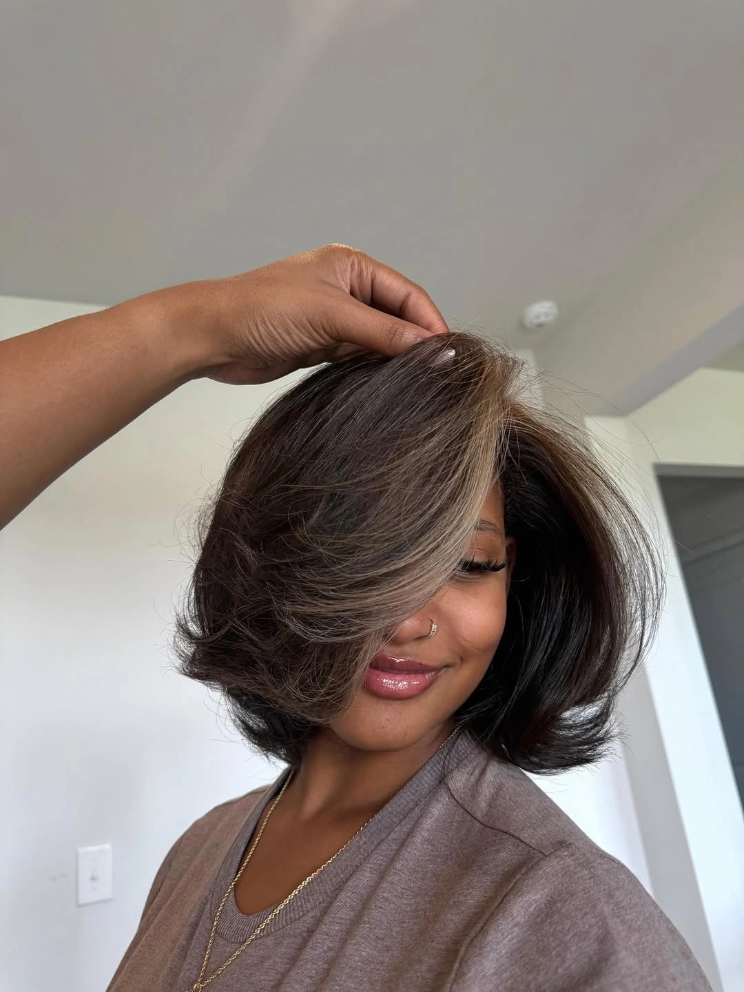 bob hairstyles for black women Dimensional Bob With Face-Framing Contrast