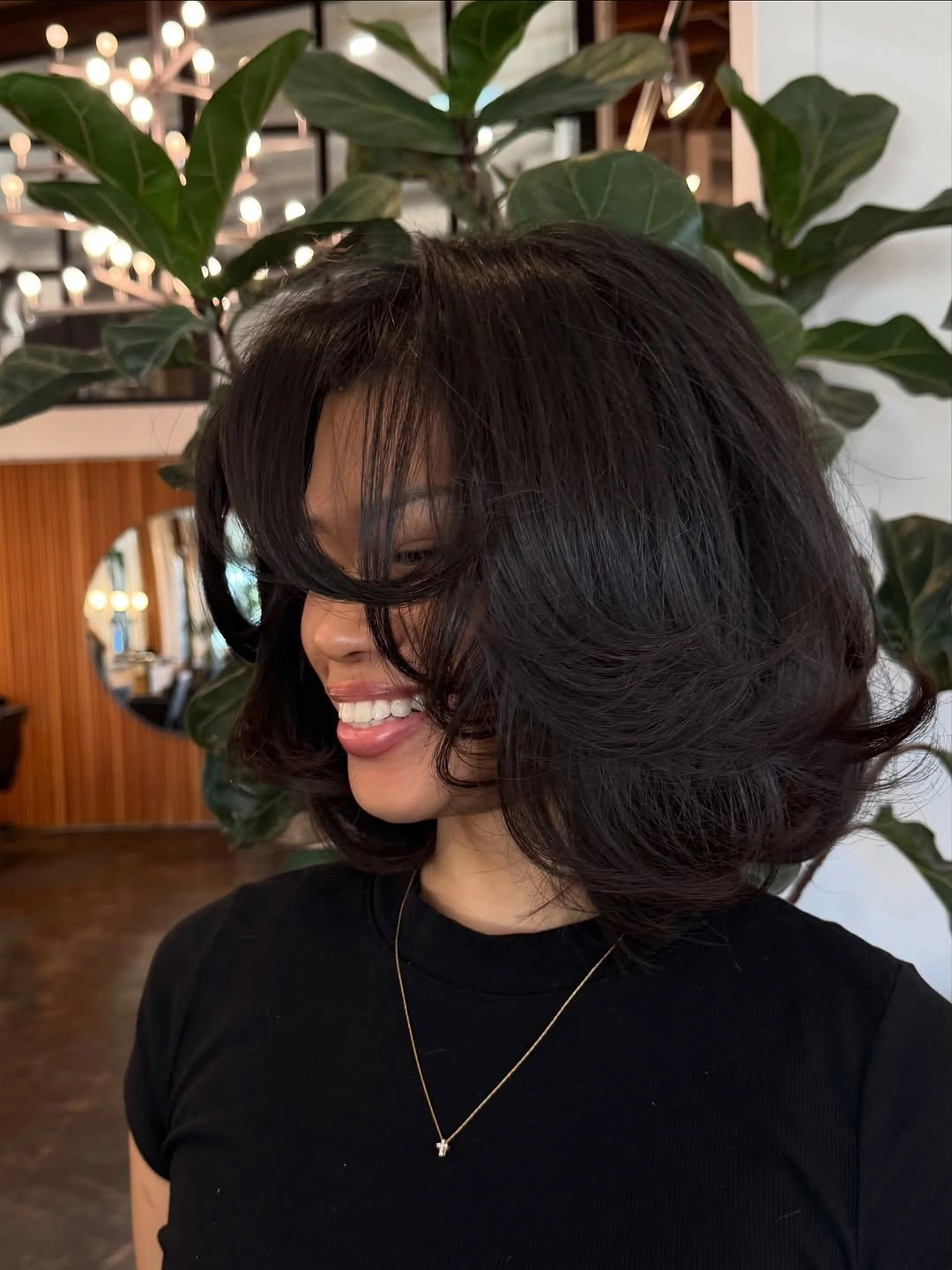 bob hairstyles for black women Voluminous Layered Bob With Curtain Bangs
