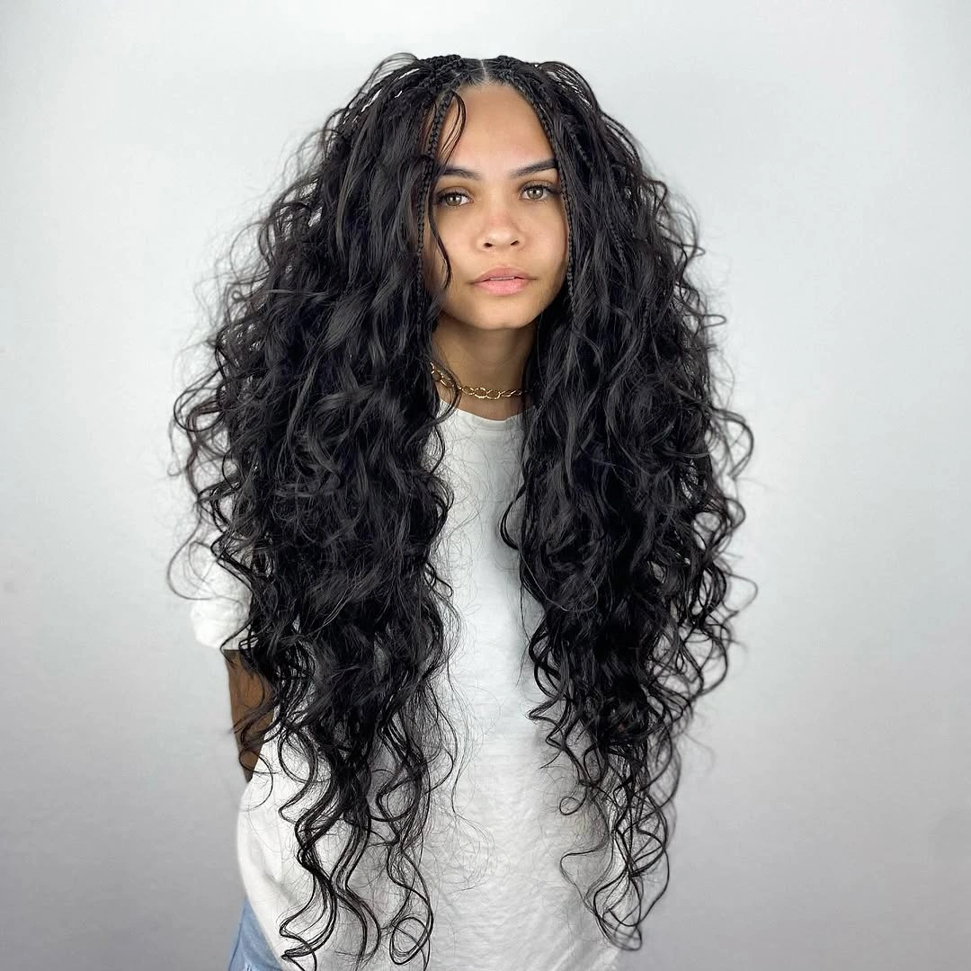 bora bora braids hairstyle Voluminous Black Curls With Playful Mini Braids