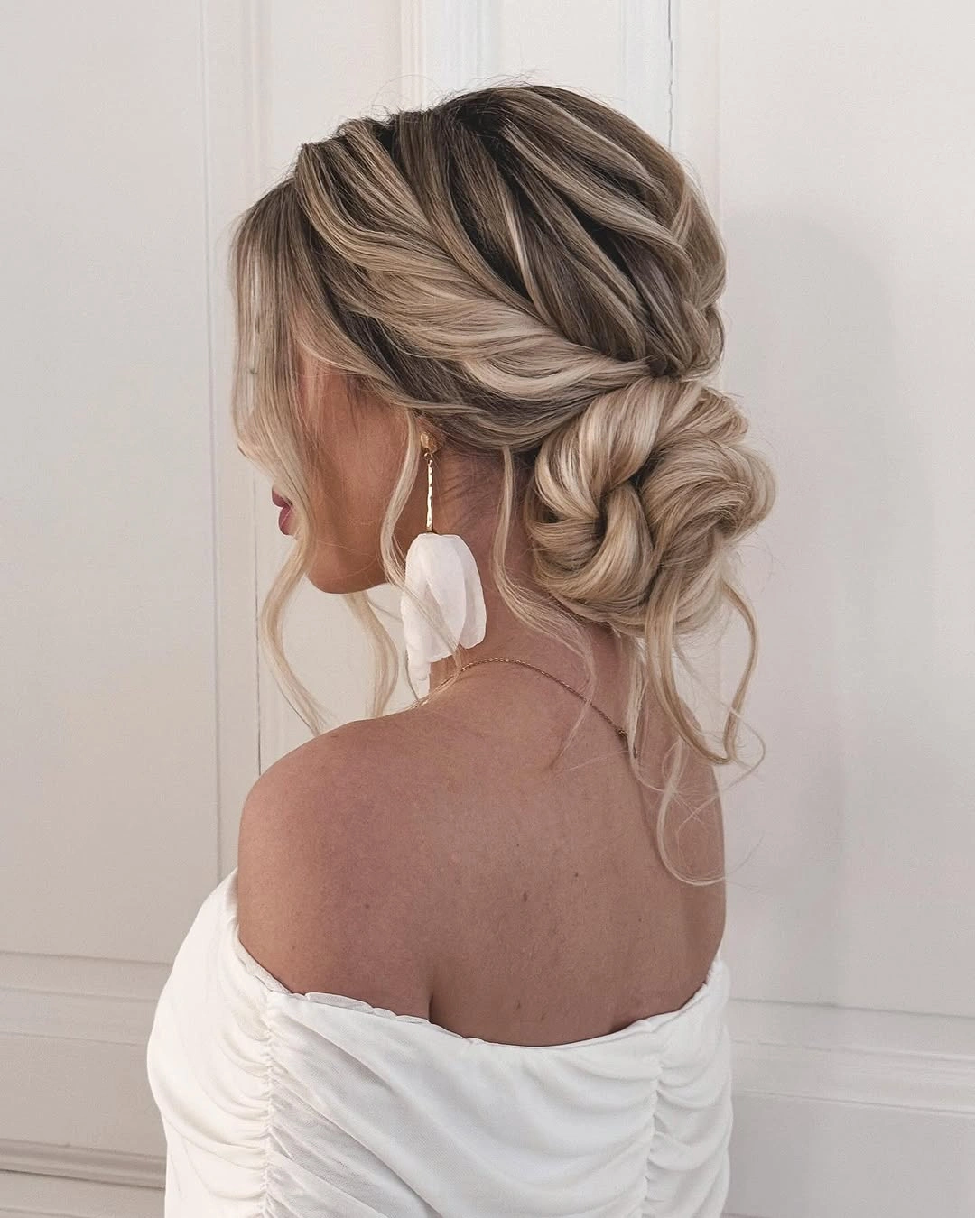 bridesmaid hairstyling Low Twisted Bridal Inspired Bun