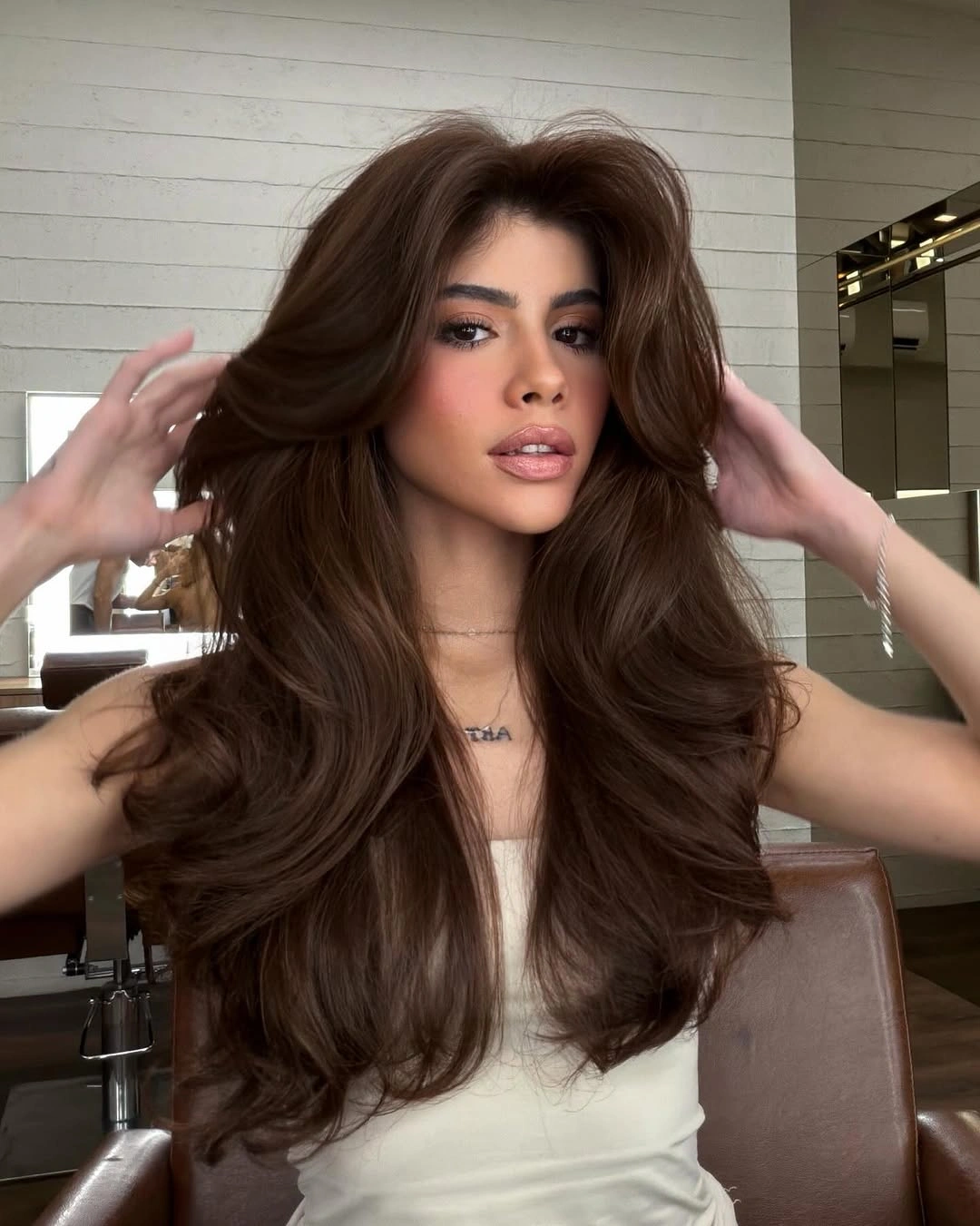 chestnut brown hair color Voluminous Layered Chestnut With Modern Glamour