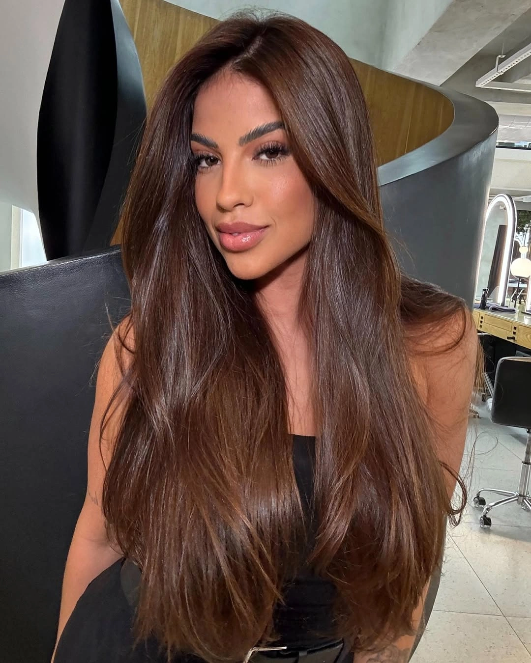 chestnut brown hair color Sleek Chestnut Brown With Seamless Dimension