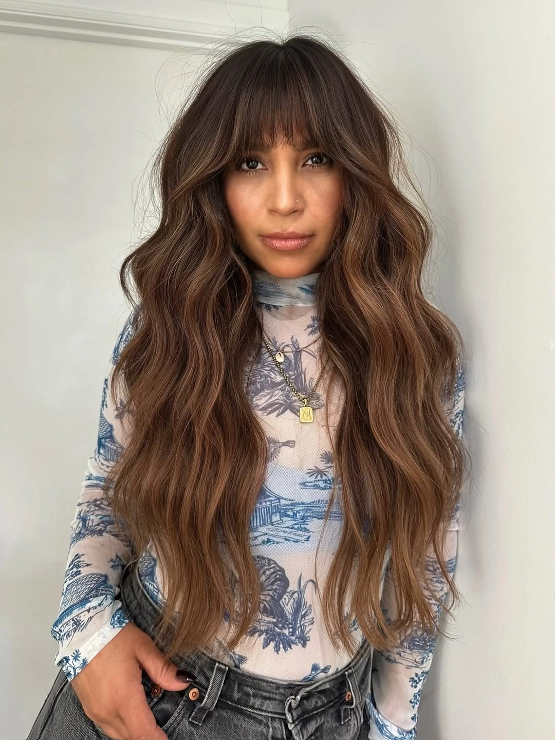 dimensional brunette hair color Warm Cinnamon Brunette With Wispy Bangs