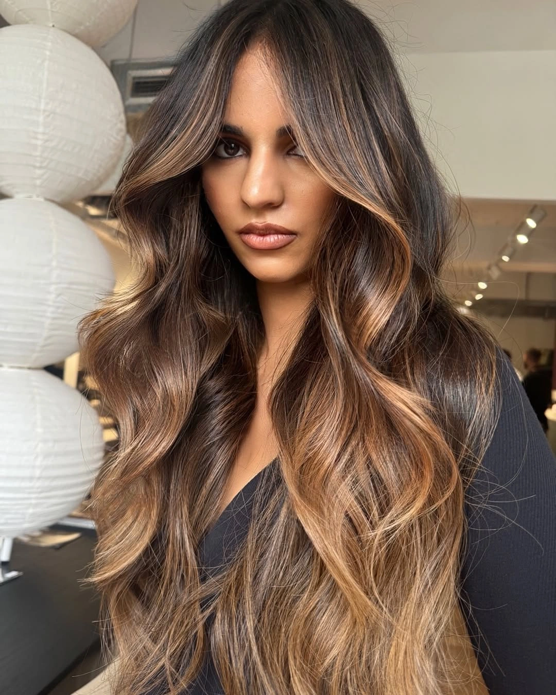 dimensional brunette hair color Caramel Melt With Flowing Lengths