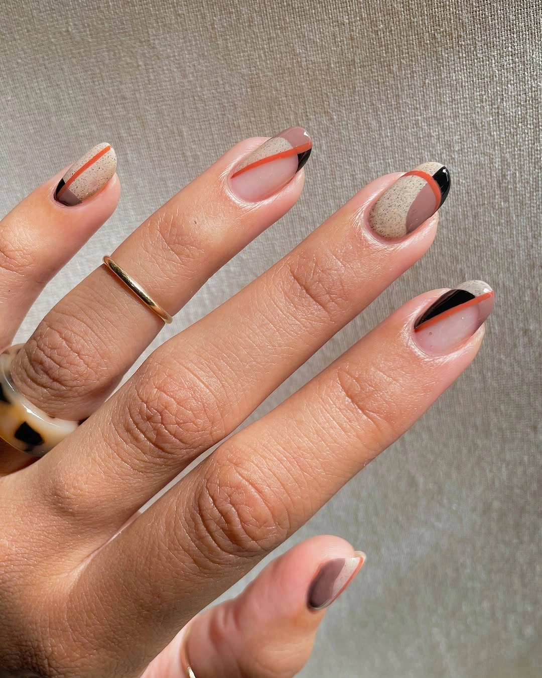 fall almond nails 2026 Modern Earth Tone Abstract Almond Nails