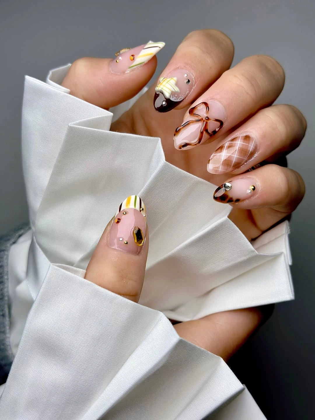 fall almond nails 2026 Mixed Autumn Accent Almond Nails