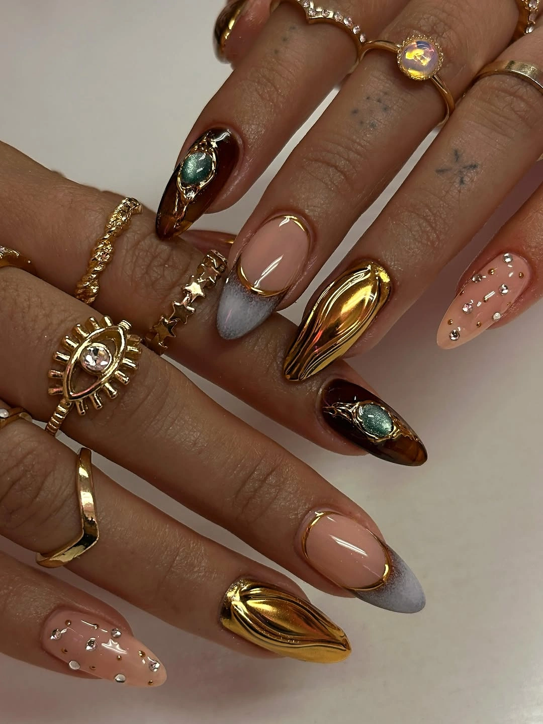 fall almond nails 2026 Molten Gold and Chocolate Almond Nails for a Luxe Fall Statement