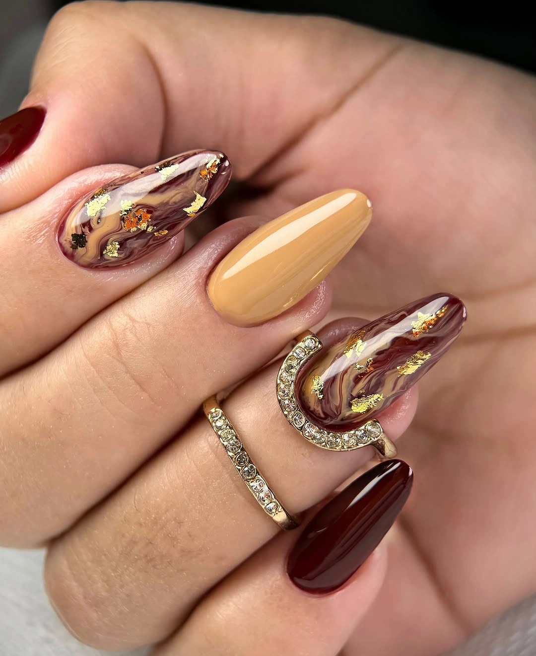 fall almond nails 2026 Brown Marble Almond Nails with Gold Foil Elegance
