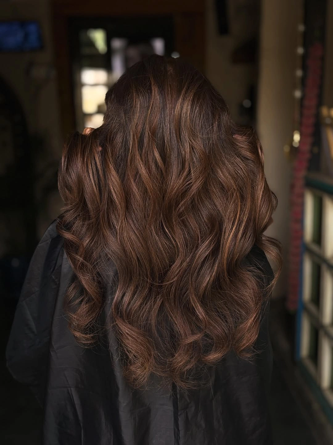 fall brunette hair colour 2026 Soft Chocolate Brunette With Glossy Ribbon Waves