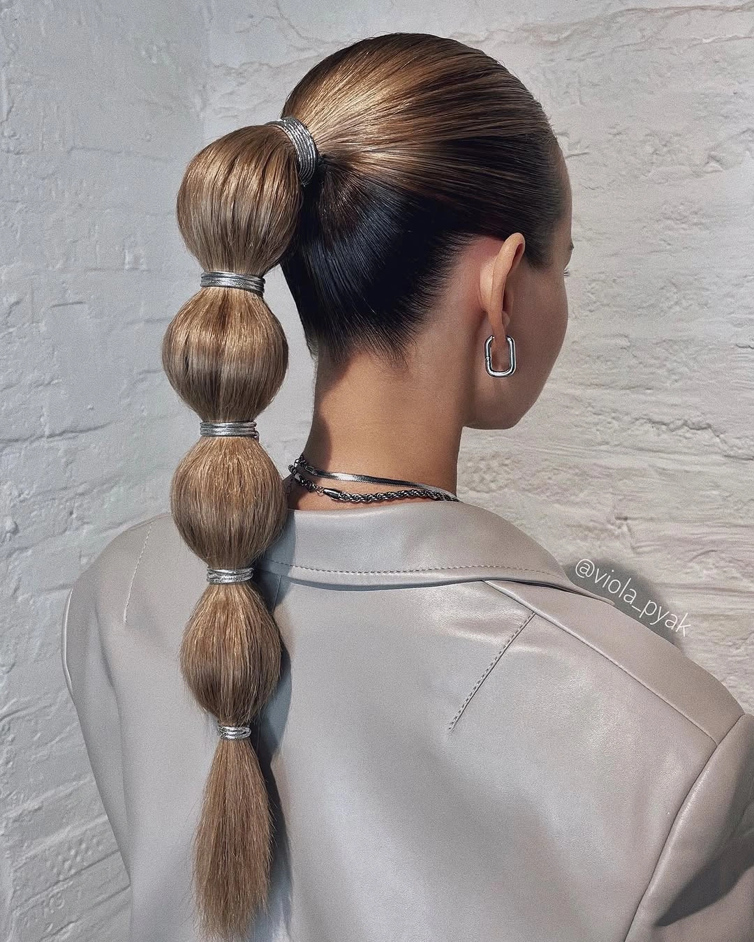 fall hairstyles 2026 Sculptural Bubble Ponytail With A Modern Finish