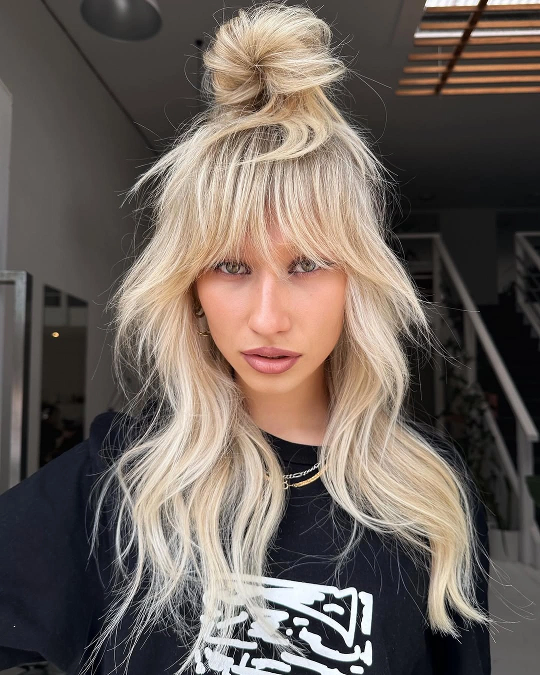 fall hairstyles 2026 Blonde Shag With Half Up Bun