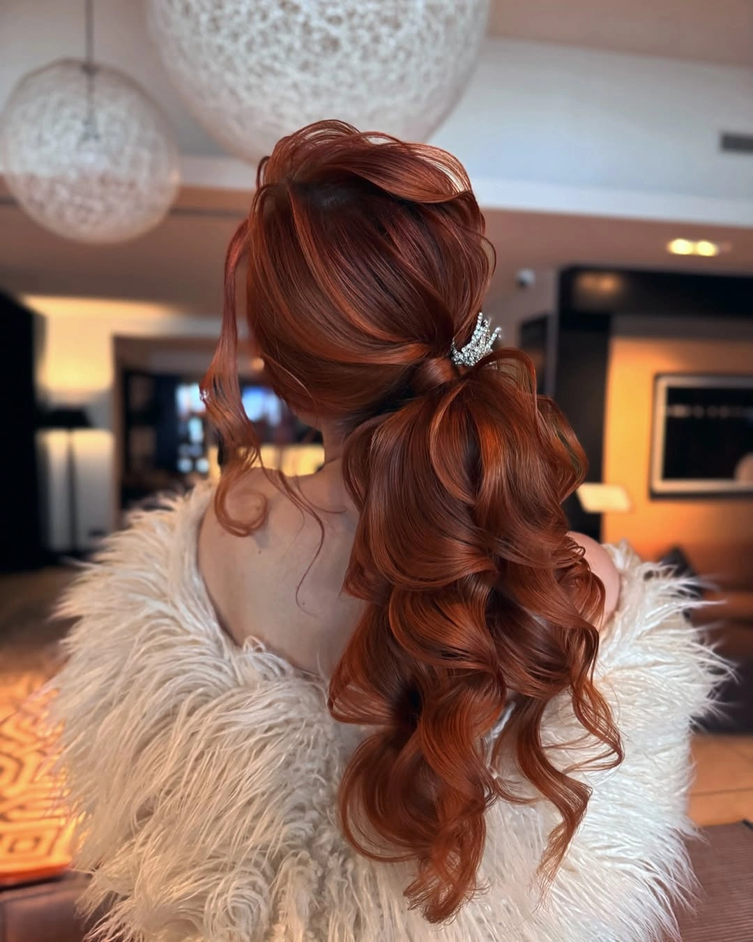 fall hairstyles 2026 Soft Copper Side Ponytail With Romantic Waves