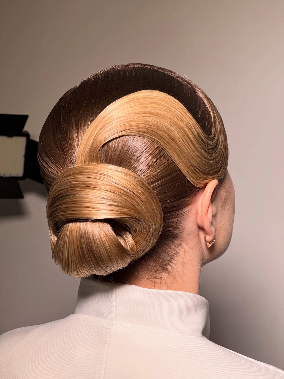 fall hairstyles for long hair 2026 Sleek Sculptural Low Bun
