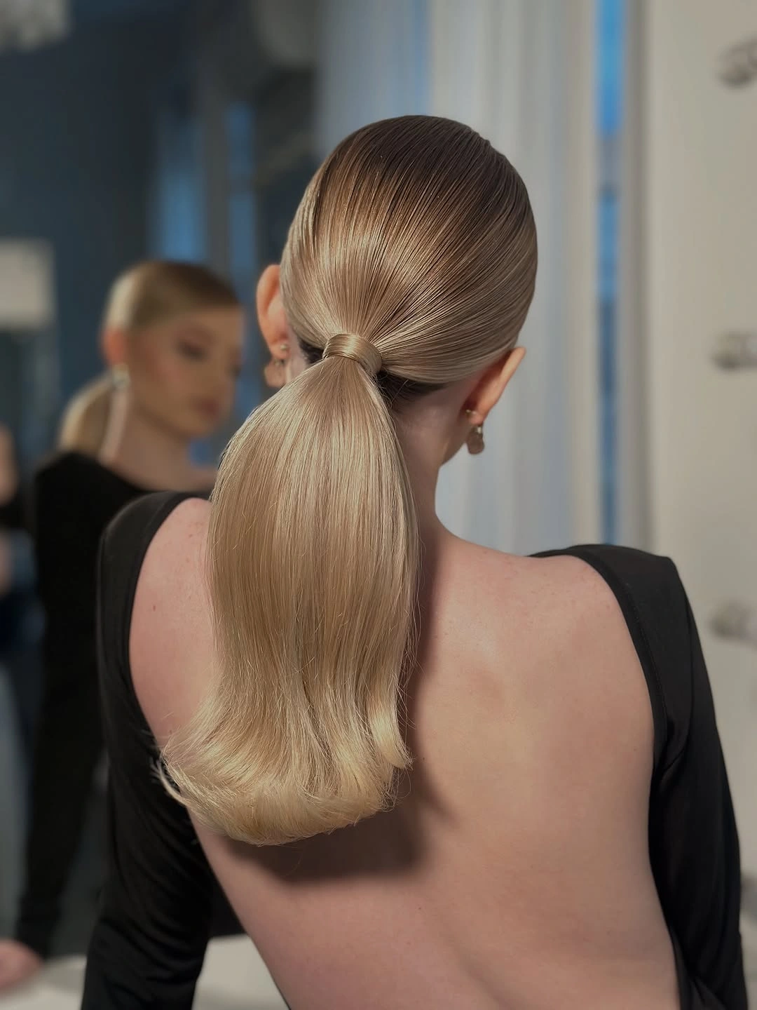 fall hairstyles for long hair 2026 Glossy Low Ponytail With Timeless Elegance