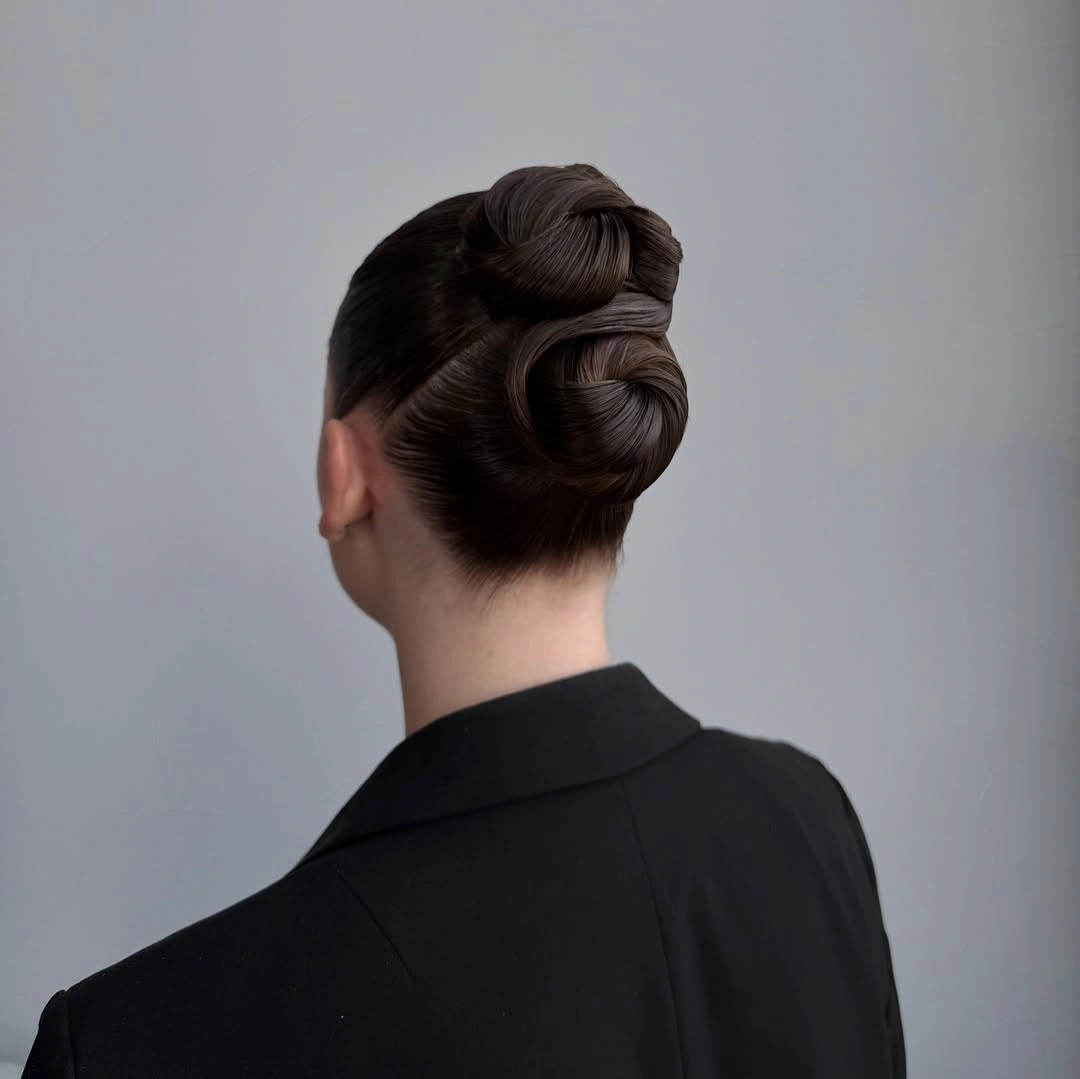 fall hairstyles for office 2026 Architectural Twisted Formal Bun