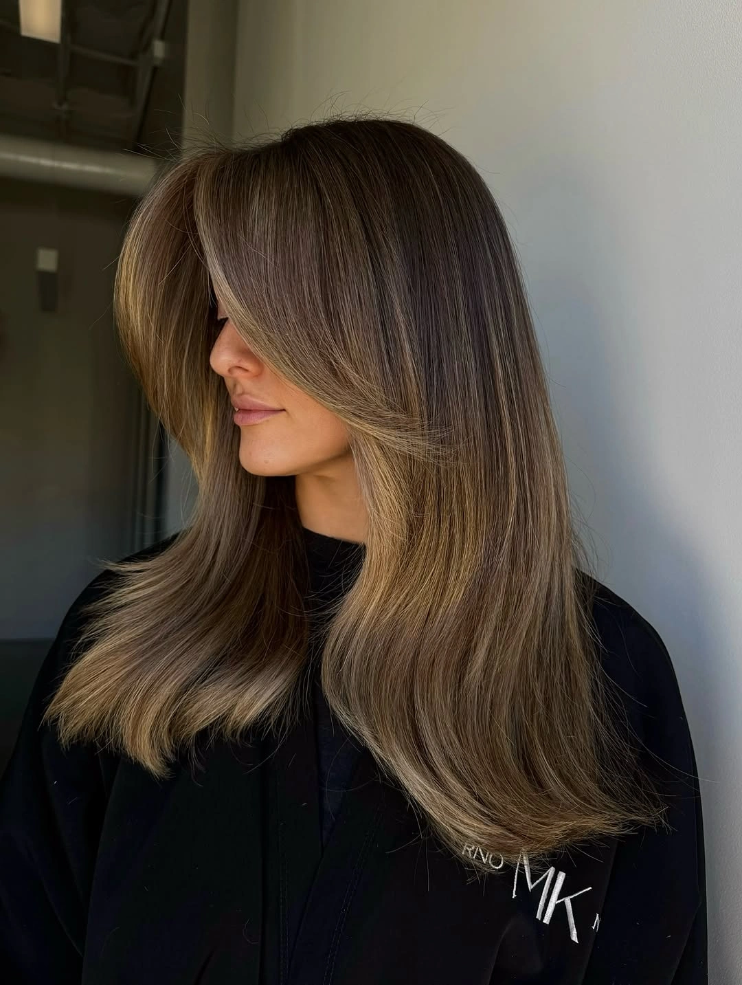 fall hairstyles for office 2026 Soft Layers With Curtain Bangs