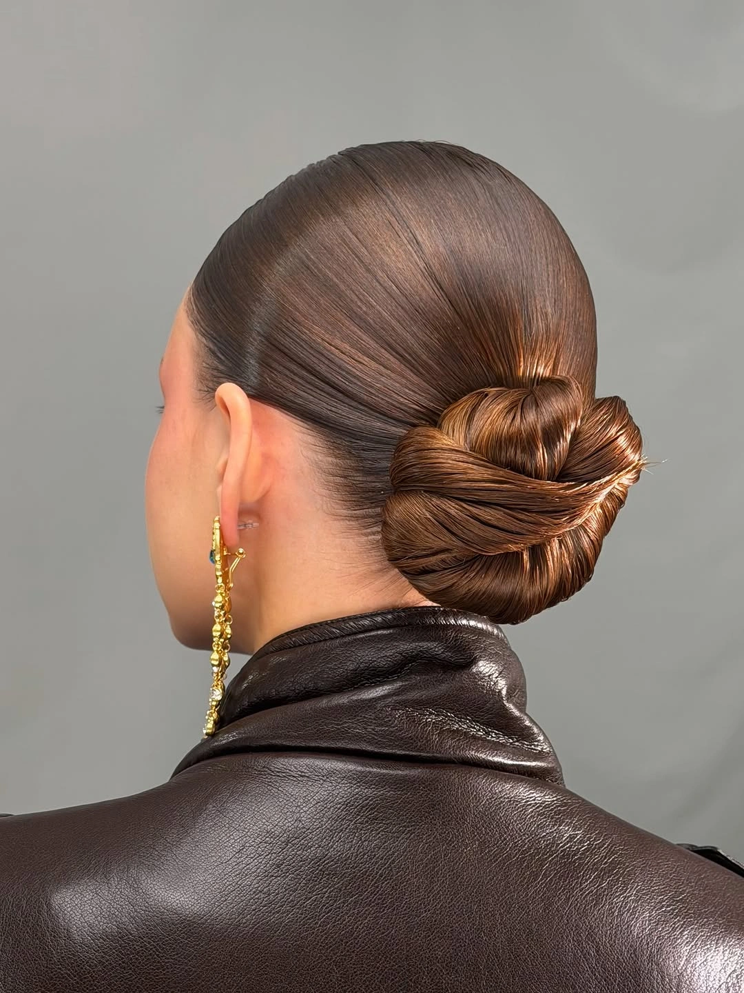 fall hairstyles for office 2026 Polished Low Formal Bun