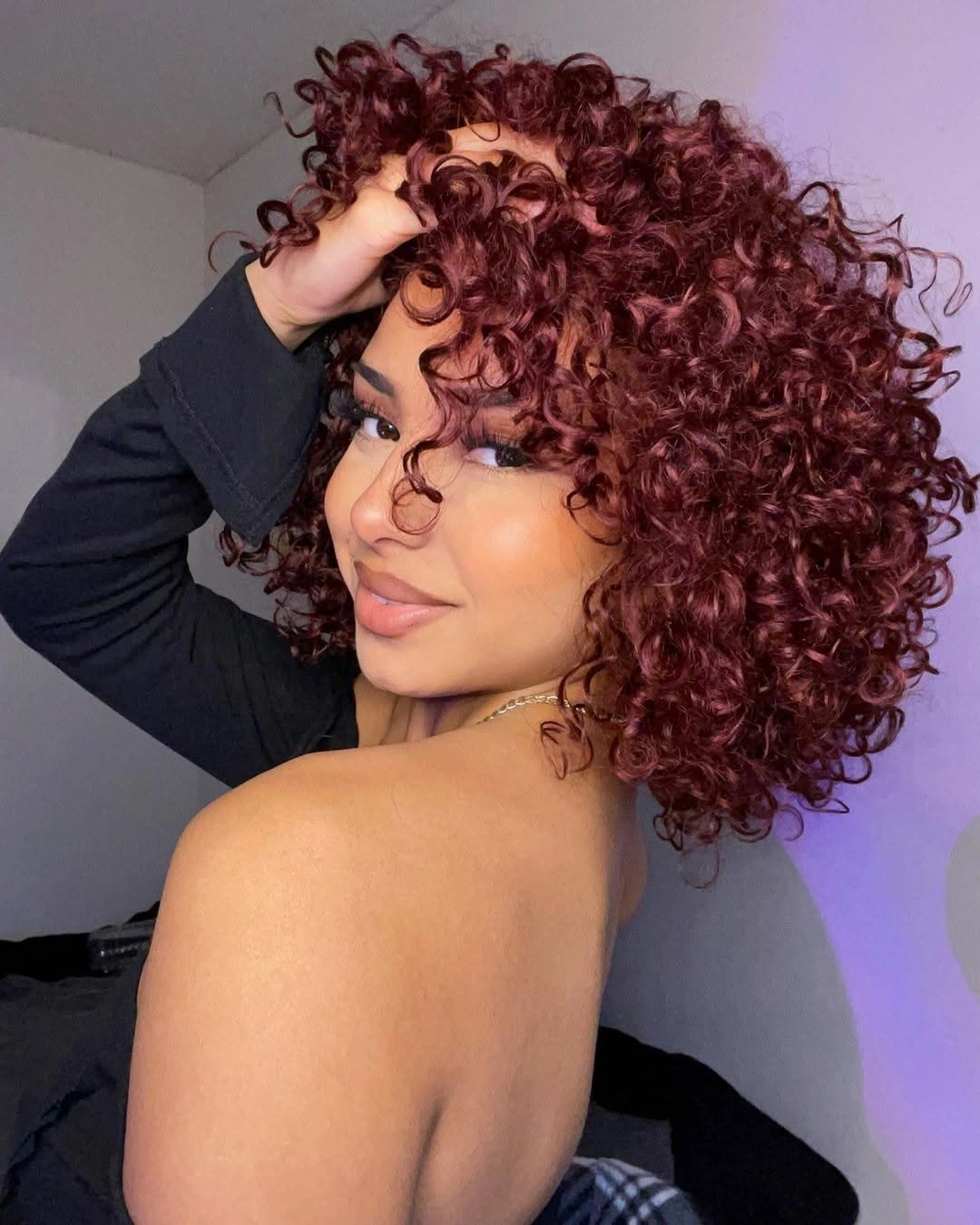fall hairstyles for office 2026 Defined Burgundy Curly Bob