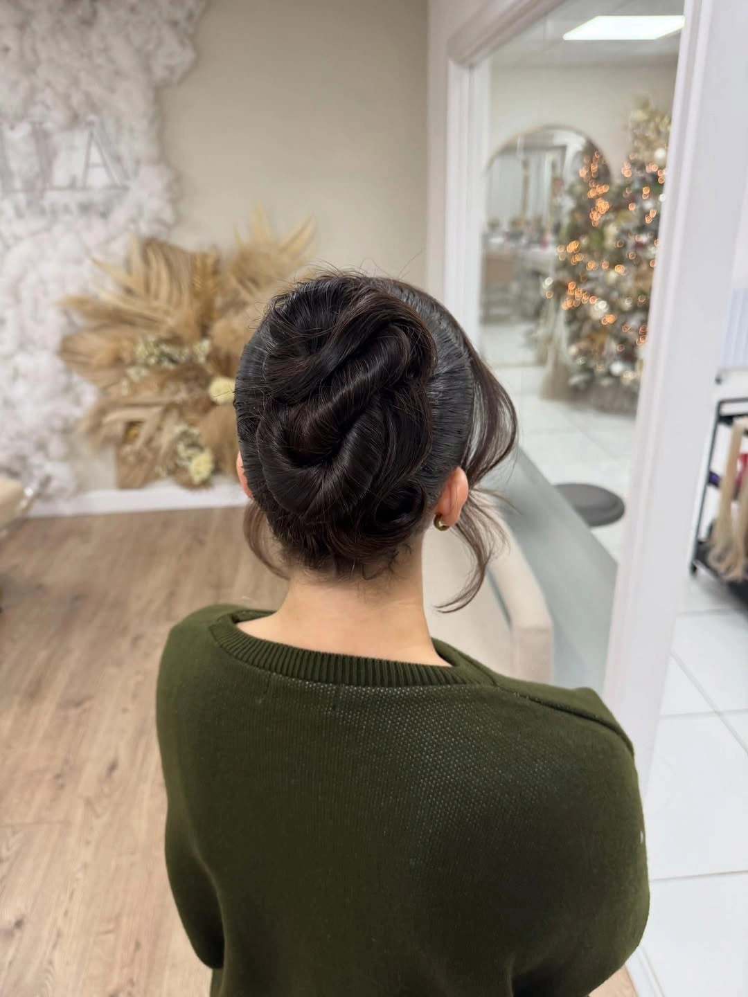 fall hairstyles for wedding guests 2026 Glossy Twisted Formal Bun