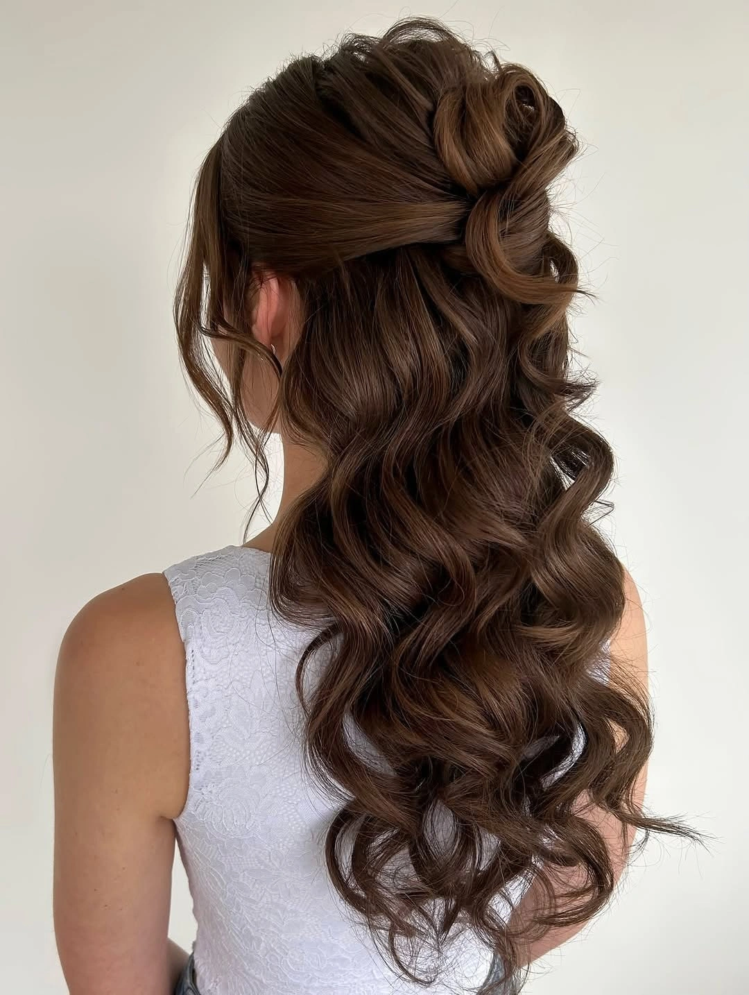fall hairstyles for wedding guests 2026 Romantic Half Up Waves With Glossy Volume