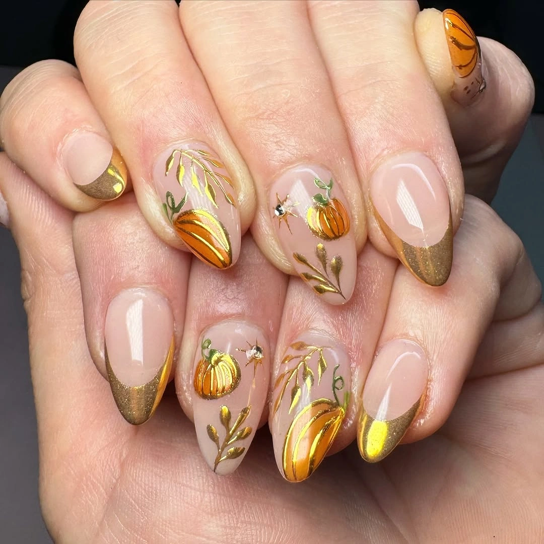 fall medium nail ideas 2026 Gold French Tips with Pumpkin Nail Art