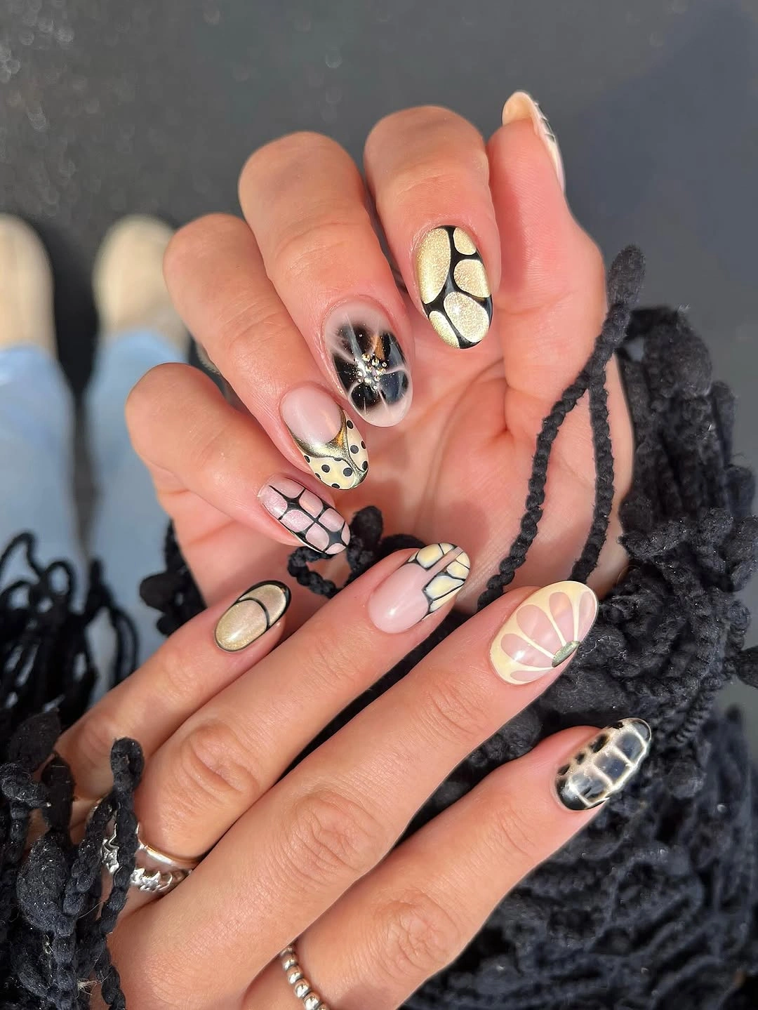 fall medium nail ideas 2026 Modern Metallic Art With Graphic Details