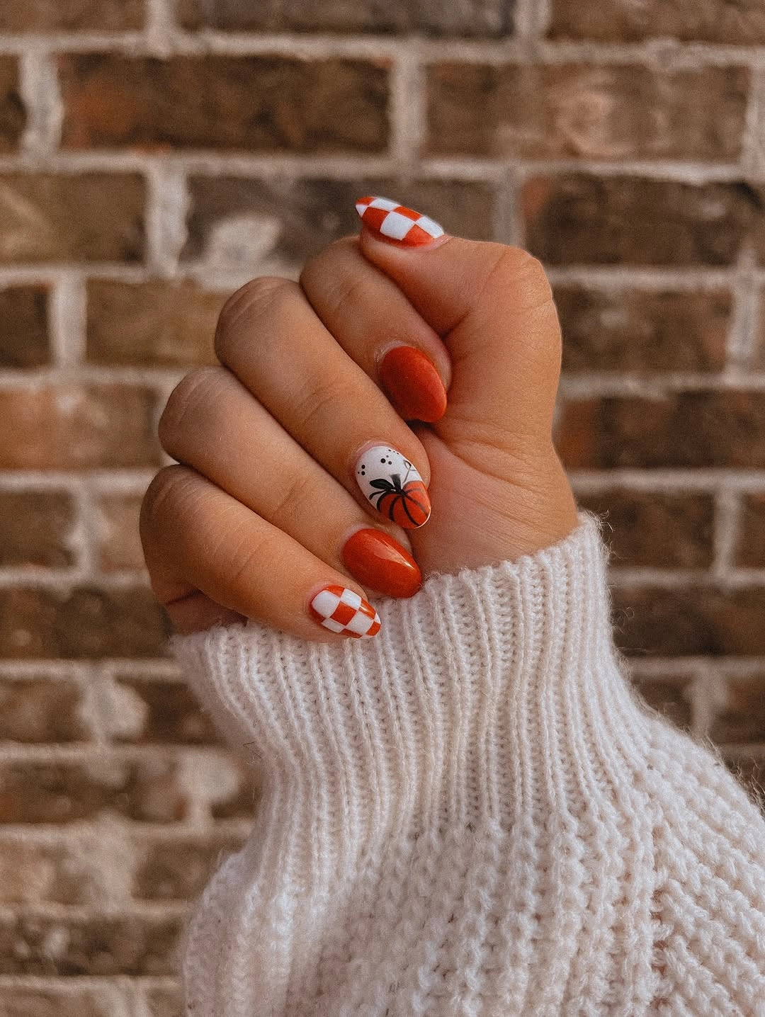 fall medium nail ideas 2026 Playful Pumpkin and Checkerboard Fall Nail Set