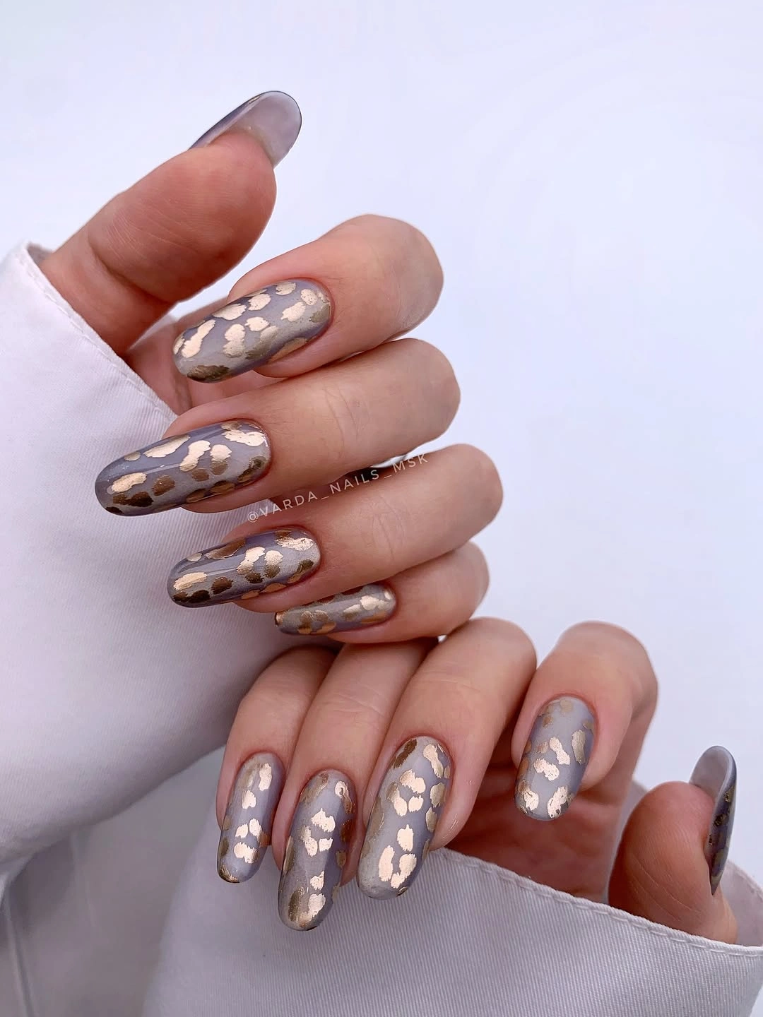 fall nail art 2026 Smoky Gray Leopard Nails with Metallic Shine