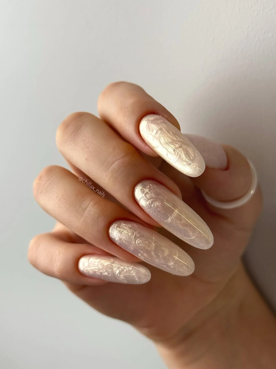 fall nail art 2026 Pearl Chrome Nails With a Soft Velvet Glow