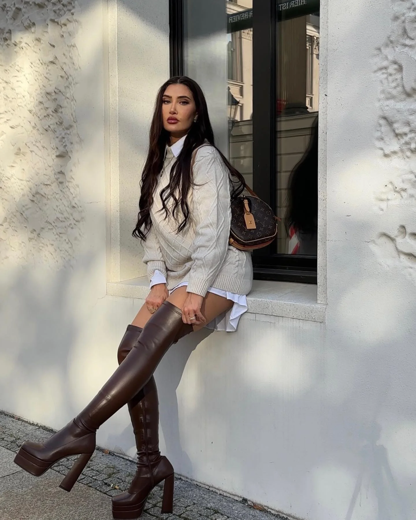 fall outfits with heeled boots 2026 Cozy Knit Dress With Statement Brown Boots
