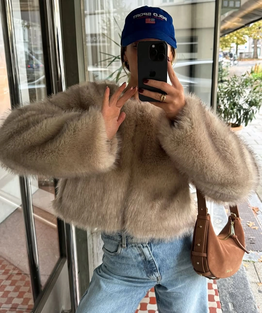 Faux Fur Jacket Outfit Ideas Every Woman Will Want To Wear This Winter 3 faux fur jacket Relaxed Denim With A Cropped Faux Fur Jacket