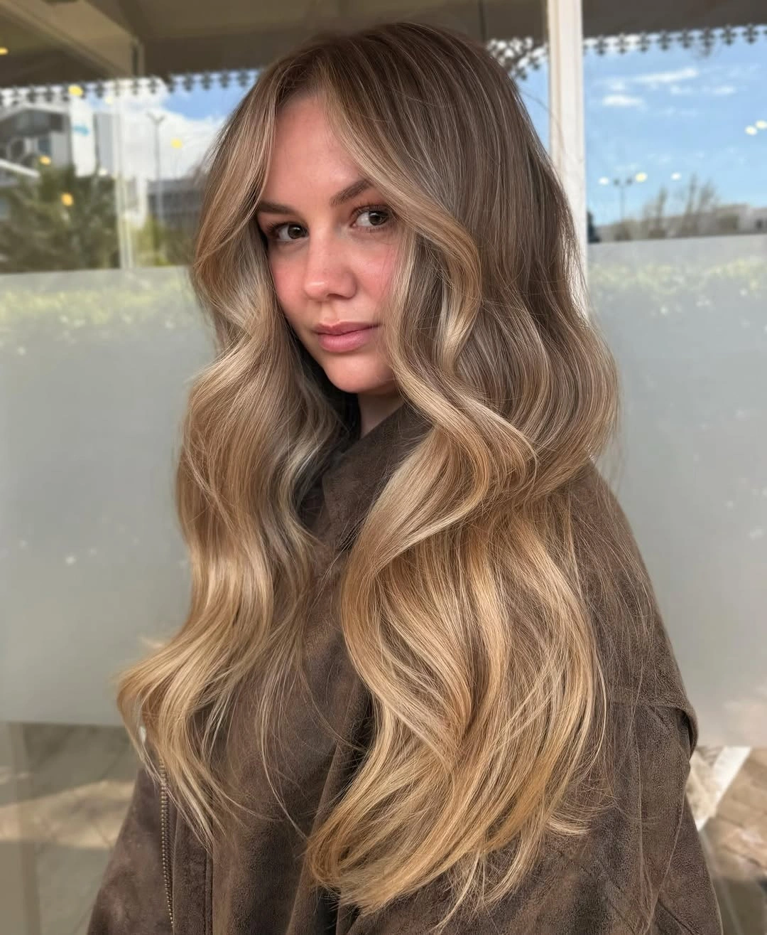 dirty blonde hair color Soft Mushroom Blonde With Flowing Waves