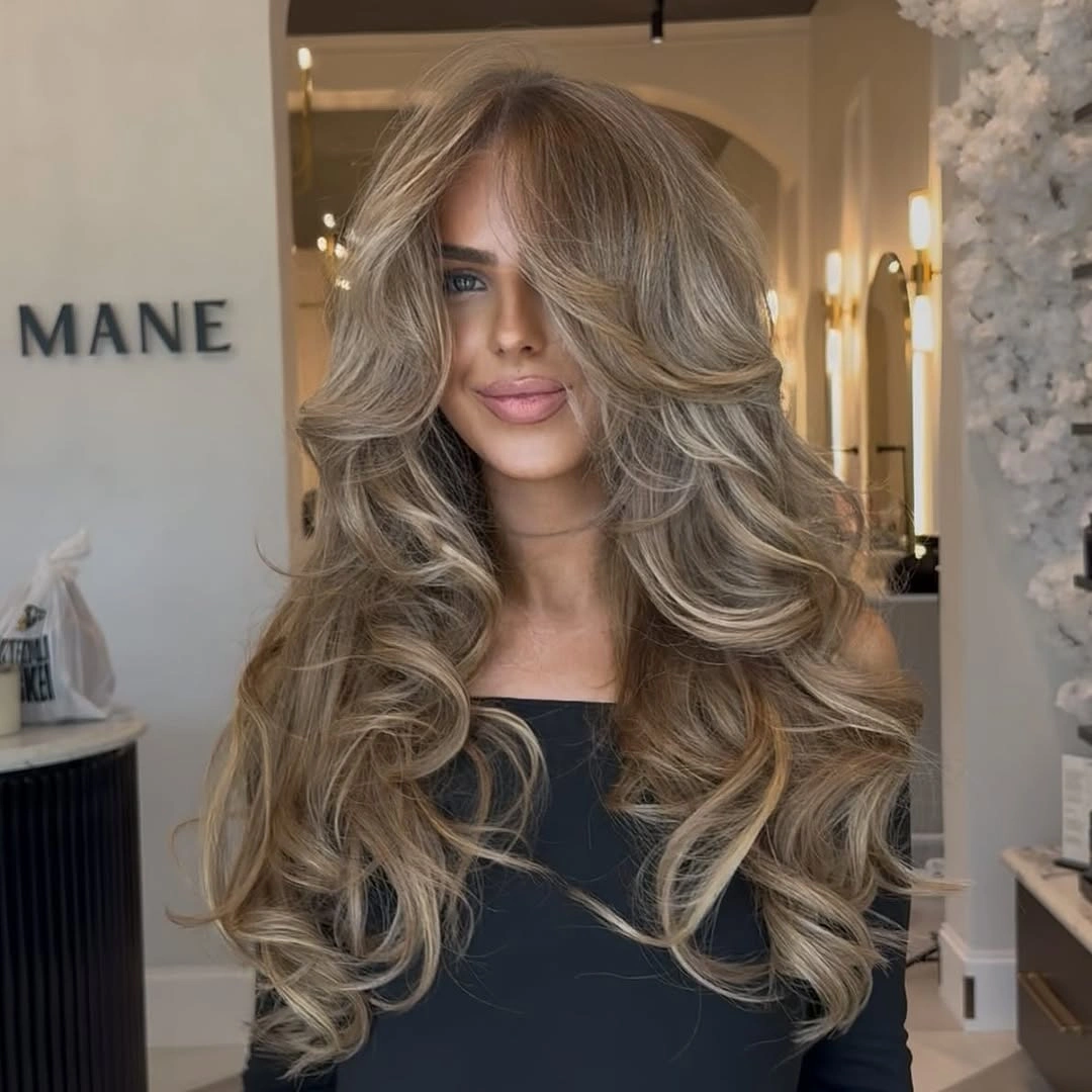 hair lowlights: color ideas and inspiration Layered Champagne Volume With Soft Contrast