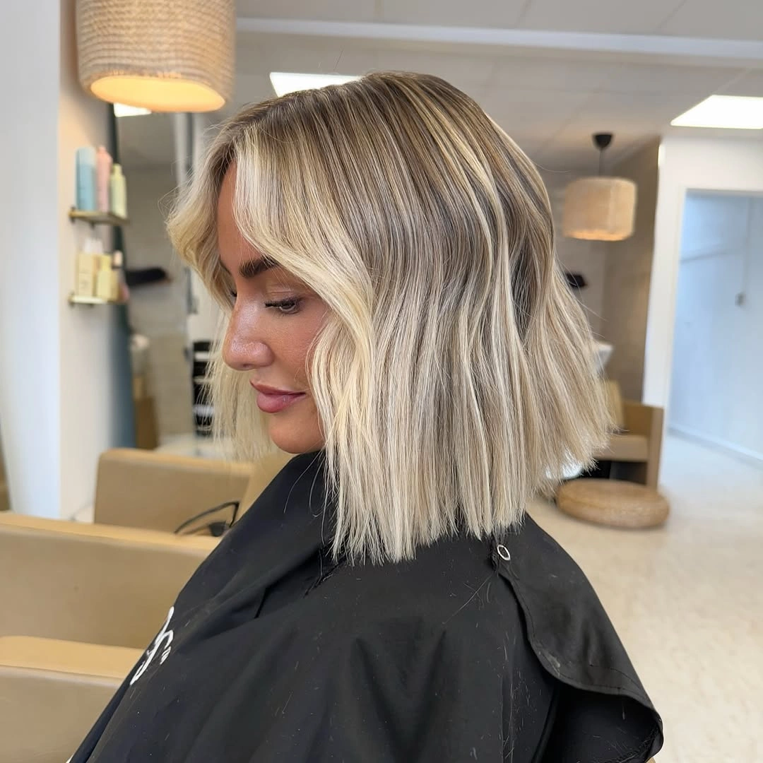hair lowlights: color ideas and inspiration Bright Blonde Bob With Delicate Depth