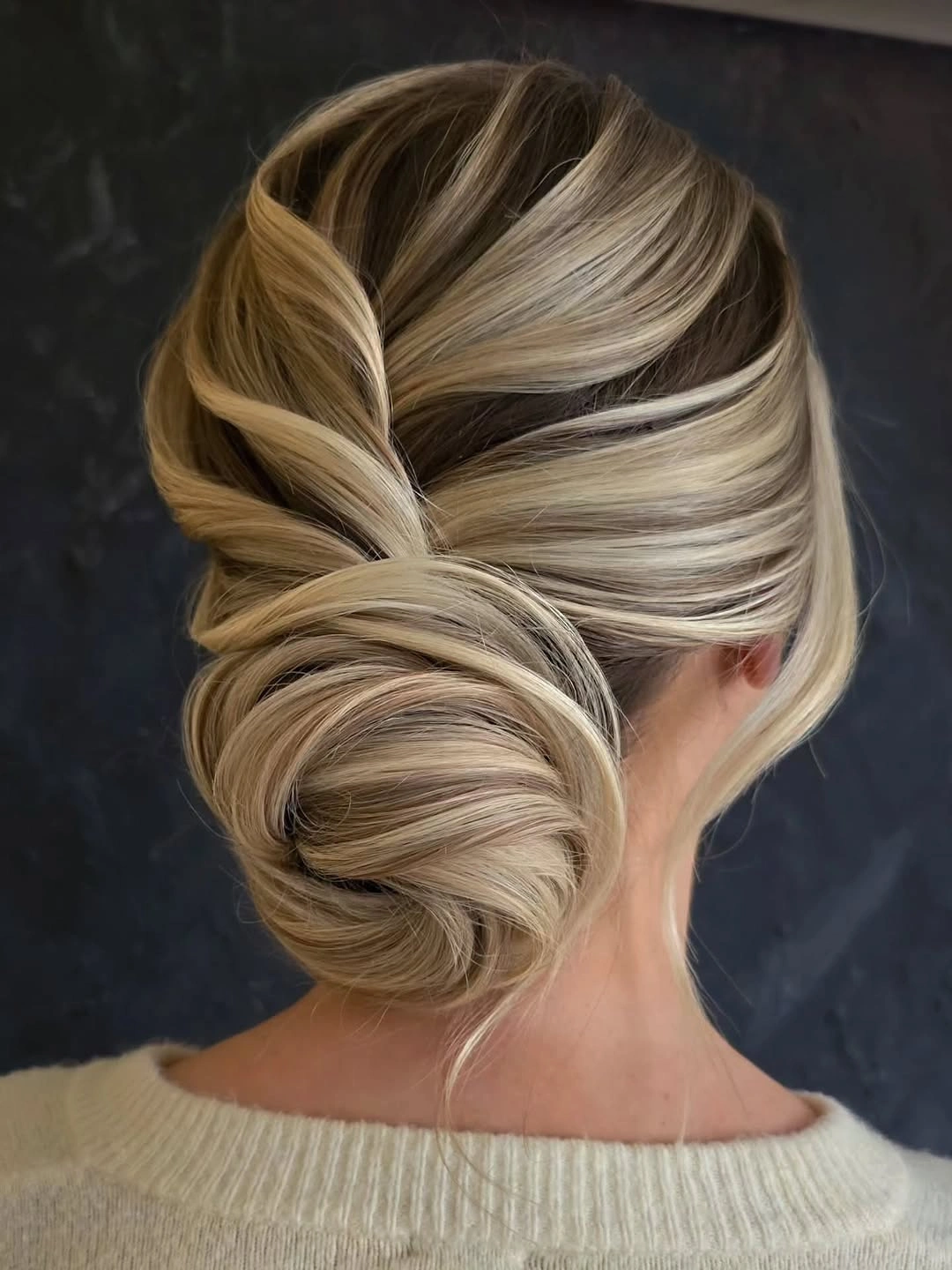 september hairstyles ideas 2026 Elegant Twisted Low Bun