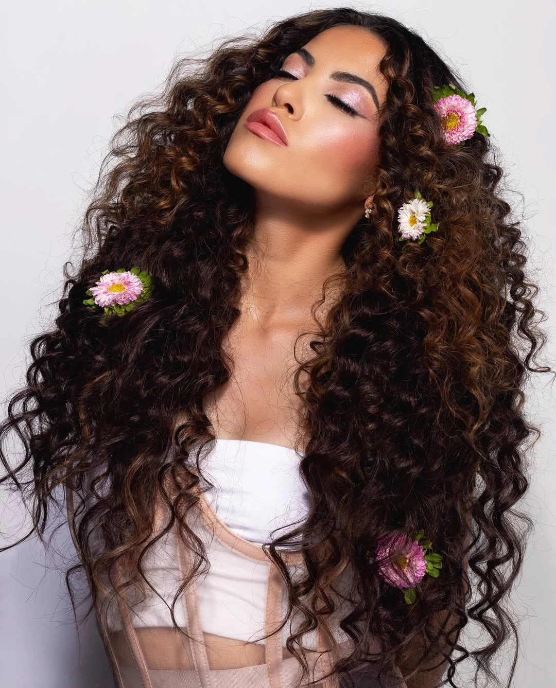 september hairstyles ideas 2026 Defined Natural Curls With Floral Touches